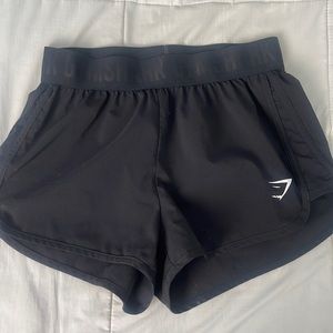 barely worn black gymshark running shorts !